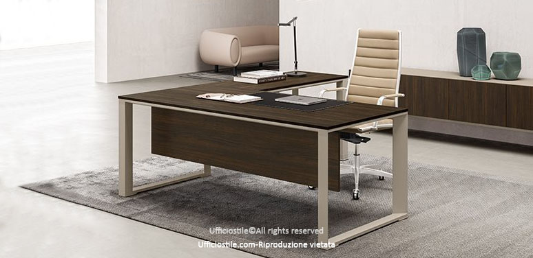 Corner executive desk with metal legs.